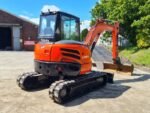 Kubota U48-4 Mini pelle 5 tonnes — attache rapide, système hydraulique BRH commande manuelle, chenilles extensibles 90%, révisée, 2011 occasion